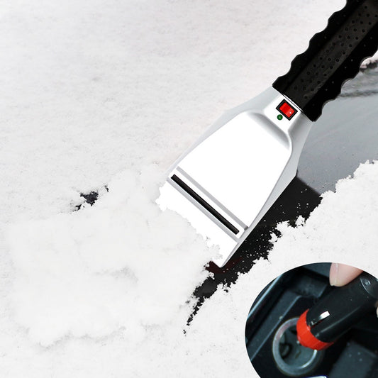 Heatable snow removal shovel for vehicle